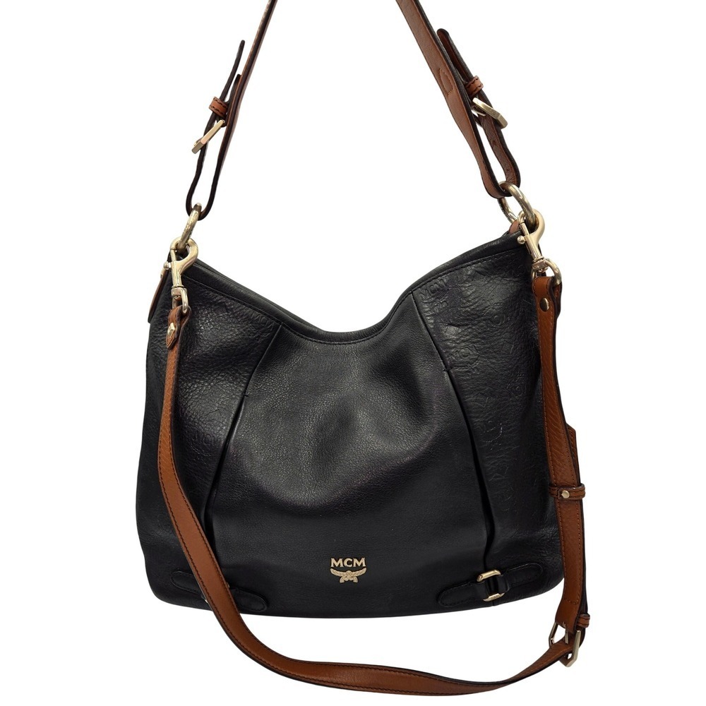 MCM Black Leather Hobo Shoulder Bag with Adjustable Strap and Logo Details